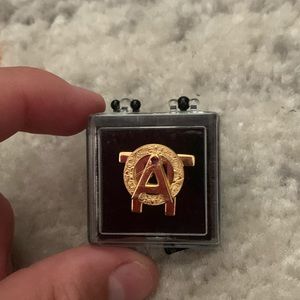 Alpha Omicron Pi sorority pin